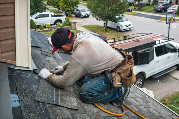 Professional Gutter Installation technician working in North Bend, OR